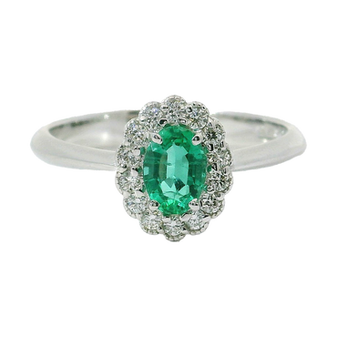 Anello oro bianco 18K con smeraldo centrale e contorno diamanti