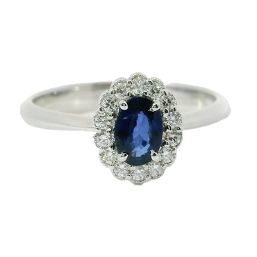 Anello oro bianco 18K con zaffiro centrale e contorno diamanti