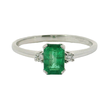 Anello oro bianco 18K con smeraldo emerald centrale e laterale diamanti