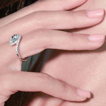 Anello contrariè oro bianco 18K con diamanti acqua marina taglio goccia