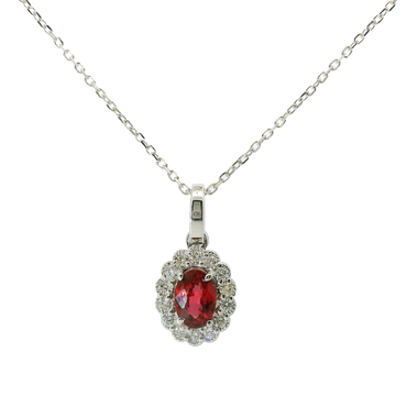 Ciondolo oro bianco 18K con rubino centrale e contorno diamanti