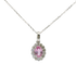 Ciondolo oro bianco 18K con zaffiro rosa naturale centrale e contorno diamanti