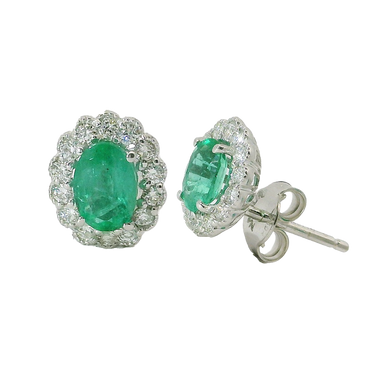 Orecchini oro bianco 18K con smeraldo centrale e contorno diamanti