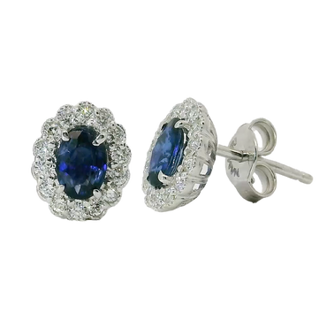 Orecchini oro bianco 18K con zaffiro centrale e contorno diamanti