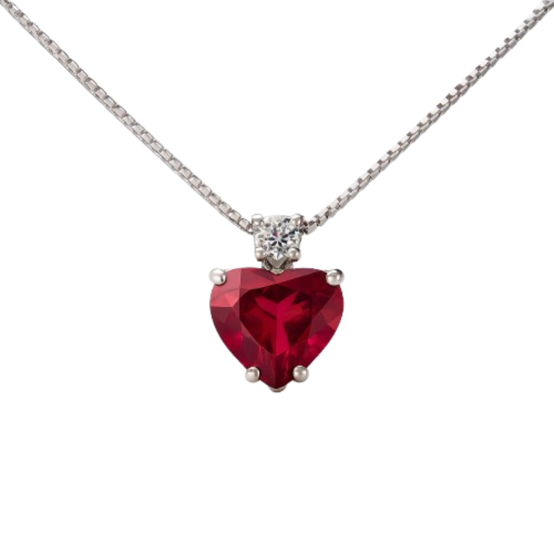 Pendente rubino cuore con diamanti e oro bianco 18K