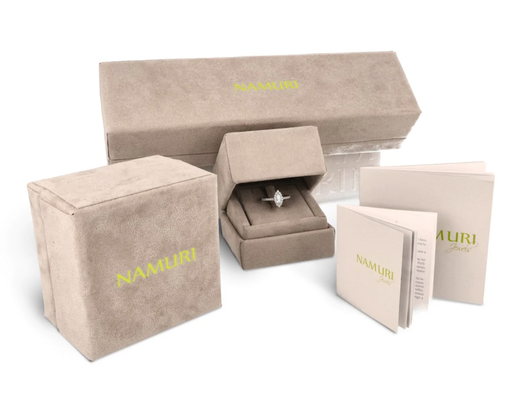 Orecchini Oro bianco 18K con diamanti con centrale smeraldo